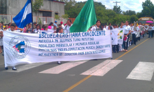 CCS marches in a holiday parade in Masaya.